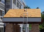 Re-Roofing using pro lock metal panels at Waterstone, Surrey BC